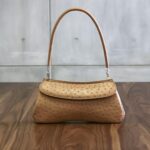 Stylish ostrich leather handbag perfect for fashion-forward individuals.